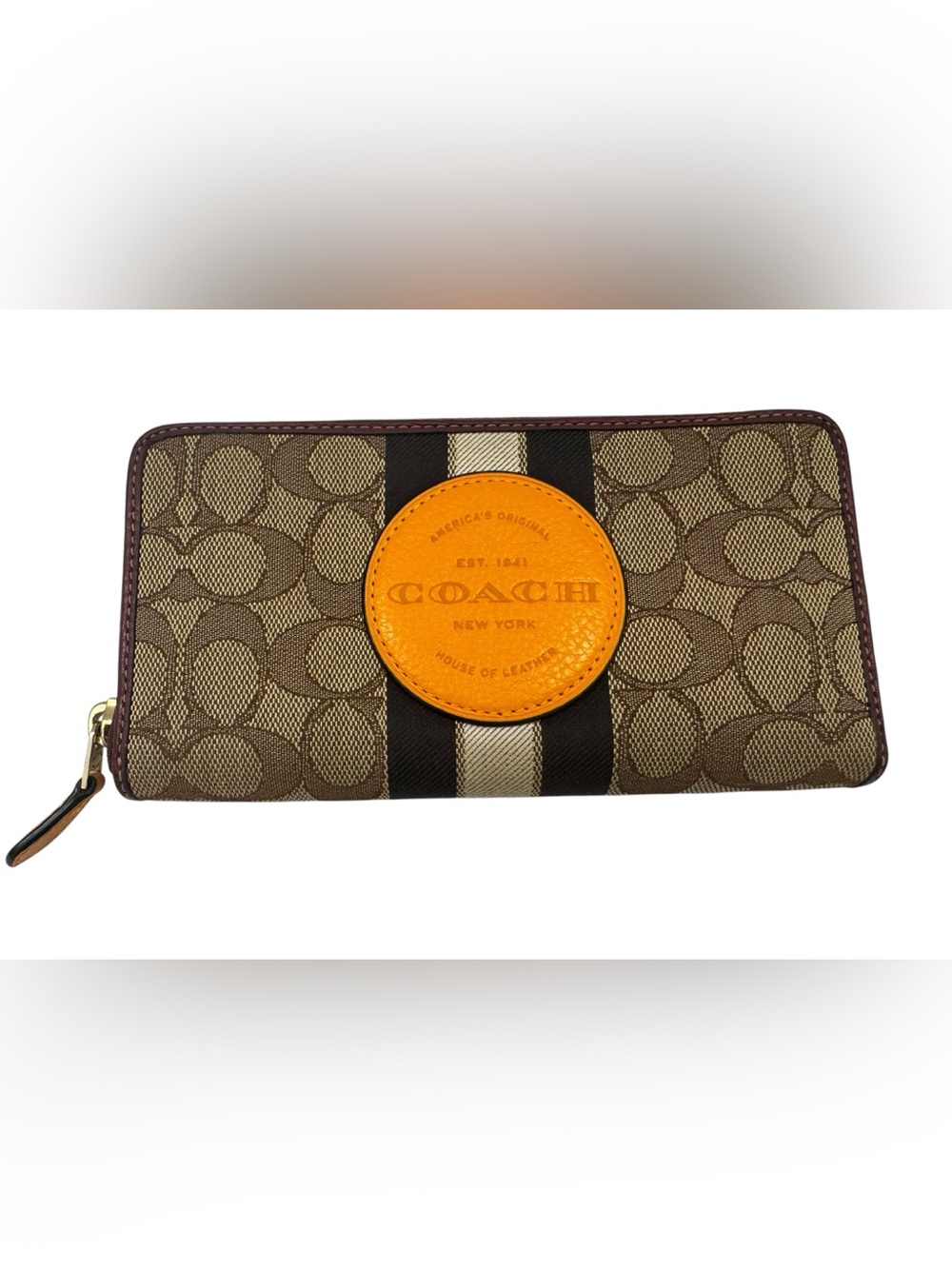 COACH Dempsey Signature Zip Around Wallet in Brown with Orange Patch